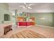 Open-concept living area with a fireplace, kitchen bar, and ample space at 3071 Misty Moon Ave, Henderson, NV 89052