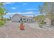 Large backyard featuring desert landscaping with privacy and mature trees at 3109 Hawksdale Dr, Las Vegas, NV 89134