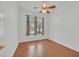 Inviting bedroom with a ceiling fan and natural light from the large window at 3109 Hawksdale Dr, Las Vegas, NV 89134
