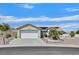 Charming single-story home featuring a well-maintained front yard and a two-car garage at 3109 Hawksdale Dr, Las Vegas, NV 89134