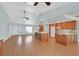Bright, open-concept living space with hardwood floors and kitchen featuring an island at 3109 Hawksdale Dr, Las Vegas, NV 89134