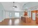 Bright, open-concept space with hardwood floors, featuring a large kitchen island at 3109 Hawksdale Dr, Las Vegas, NV 89134