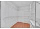 Spacious walk-in closet with adjustable shelving and wood-look flooring at 3109 Hawksdale Dr, Las Vegas, NV 89134