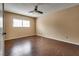 Bedroom with ceiling fan and wood floor at 3350 Duece St, Las Vegas, NV 89121