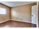 Bedroom with window, wood floors, and neutral paint at 3350 Duece St, Las Vegas, NV 89121