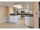 Open kitchen area with bright lighting and stainless steel appliances at 3350 Duece St, Las Vegas, NV 89121