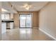 Stylish living area featuring access to outdoor patio and modern kitchen at 3350 Duece St, Las Vegas, NV 89121