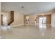 Inviting living room with access to stairs, the kitchen, and natural lighting at 3350 Duece St, Las Vegas, NV 89121