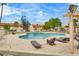 Resort-style community pool with lounge chairs for sunbathing, perfect for recreation at 3350 Duece St, Las Vegas, NV 89121