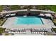 Aerial view of a pool with plenty of lounge chairs, tables and shade at 375 Silva Place Pl, Henderson, NV 89011