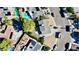 Aerial view of a residential neighborhood featuring several backyard pools and desert landscaping at 3950 Ventura Way, Las Vegas, NV 89121