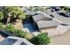 Aerial view of a well-maintained home with a stone driveway, mature trees, and a neutral-toned exterior at 3950 Ventura Way, Las Vegas, NV 89121