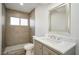 Modern bathroom featuring a stylish vanity, updated fixtures, and a beautifully tiled walk-in shower at 3950 Ventura Way, Las Vegas, NV 89121