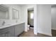 Modern bathroom featuring a double sink vanity and a walk-in shower at 3950 Ventura Way, Las Vegas, NV 89121