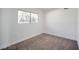 Cozy bedroom featuring carpet flooring and a window offering natural light at 3950 Ventura Way, Las Vegas, NV 89121