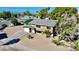Aerial view of two-story home with desert landscaping, and long driveway at 3950 Ventura Way, Las Vegas, NV 89121