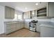 Bright kitchen featuring stainless steel appliances, ample counter space, and modern cabinets, perfect for cooking enthusiasts at 3950 Ventura Way, Las Vegas, NV 89121