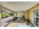Covered back patio, perfect for outdoor relaxation and entertainment, surrounded by lush greenery at 40 Trailside Ct, Henderson, NV 89012