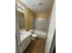 Bathroom featuring a shower/tub combo and single sink vanity at 4300 N Lamont St # 225, Las Vegas, NV 89115