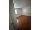 Bedroom with a window and wood-look flooring at 4300 N Lamont St # 225, Las Vegas, NV 89115