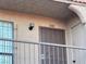 Apartment 225 exterior door with decorative window bars at 4300 N Lamont St # 225, Las Vegas, NV 89115