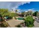 A lush landscaped backyard provides a serene outdoor living space and a tranquil retreat at 4617 Gonzales Dr, Las Vegas, NV 89130