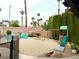 Backyard oasis featuring desert landscaping, play structure, and inviting Adirondack chairs at 4617 Gonzales Dr, Las Vegas, NV 89130