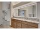 Bright bathroom with double sink vanity and large, well-lit mirror at 4617 Gonzales Dr, Las Vegas, NV 89130