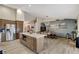 Spacious kitchen featuring stainless steel appliances, a kitchen island, and an adjacent dining area at 4617 Gonzales Dr, Las Vegas, NV 89130