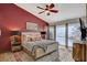 Inviting main bedroom with a vaulted ceiling, patterned rug, and modern decor for a cozy feel at 4617 Gonzales Dr, Las Vegas, NV 89130