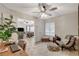 Cozy office space with a ceiling fan, natural light, and comfortable seating area at 4617 Gonzales Dr, Las Vegas, NV 89130