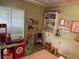 Bright playroom with built-in shelving and toy groceries at 4617 Gonzales Dr, Las Vegas, NV 89130