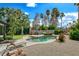Relaxing backyard pool with lush landscaping and lounge chairs at 4617 Gonzales Dr, Las Vegas, NV 89130