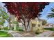Charming residential building featuring beautiful landscaping and lush foliage at 4855 S Torrey Pines Dr # 101, Las Vegas, NV 89103