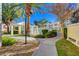 Beautifully landscaped grounds with walking paths and verdant foliage at 4855 S Torrey Pines Dr # 101, Las Vegas, NV 89103