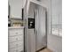 Stainless steel refrigerator featuring a water and ice dispenser at 4855 S Torrey Pines Dr # 101, Las Vegas, NV 89103