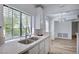 Bright kitchen with stone countertops and a large window at 4855 S Torrey Pines Dr # 101, Las Vegas, NV 89103