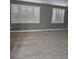 Spacious bedroom featuring two large windows with bright, white shutters at 5155 W Tropicana Ave # 2089, Las Vegas, NV 89103