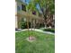 A view of the building's exterior with lush landscaping at 5155 W Tropicana Ave # 2089, Las Vegas, NV 89103