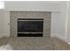 Elegant fireplace with tiled surround and a minimalist mantel design at 5155 W Tropicana Ave # 2089, Las Vegas, NV 89103