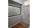 Bright entryway featuring wood floors, a large mirror, and a white front door at 5155 W Tropicana Ave # 2089, Las Vegas, NV 89103