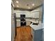 Spacious kitchen showcases white cabinetry, stainless appliances, and modern countertops at 5155 W Tropicana Ave # 2089, Las Vegas, NV 89103