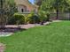 Updated landscaping with synthetic grass and manicured bushes at the West Trop Condos at 5155 W Tropicana Ave # 2089, Las Vegas, NV 89103