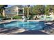 Community pool area with lounge chairs at 5155 W Tropicana Ave # 2089, Las Vegas, NV 89103