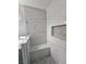Bathroom walk-in shower featuring designer tile and built in shower seat at 5155 W Tropicana Ave # 2089, Las Vegas, NV 89103