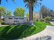 Well-manicured community sign and landscaping at the West Trop Condos at 5155 W Tropicana Ave # 2089, Las Vegas, NV 89103