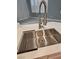 Close-up of the stainless steel sink and spring faucet, showcasing the bright counter at 5155 W Tropicana Ave # 2089, Las Vegas, NV 89103