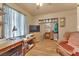 Bright bedroom features a desk area, a TV and dresser, and a large closet offering plenty of storage space at 5222 Joshua Jose St, North Las Vegas, NV 89031