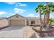 Charming single-story home featuring a well-maintained yard and a two-car garage at 5222 Joshua Jose St, North Las Vegas, NV 89031