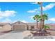 Charming single-story home featuring a well-maintained yard and a two-car garage at 5222 Joshua Jose St, North Las Vegas, NV 89031